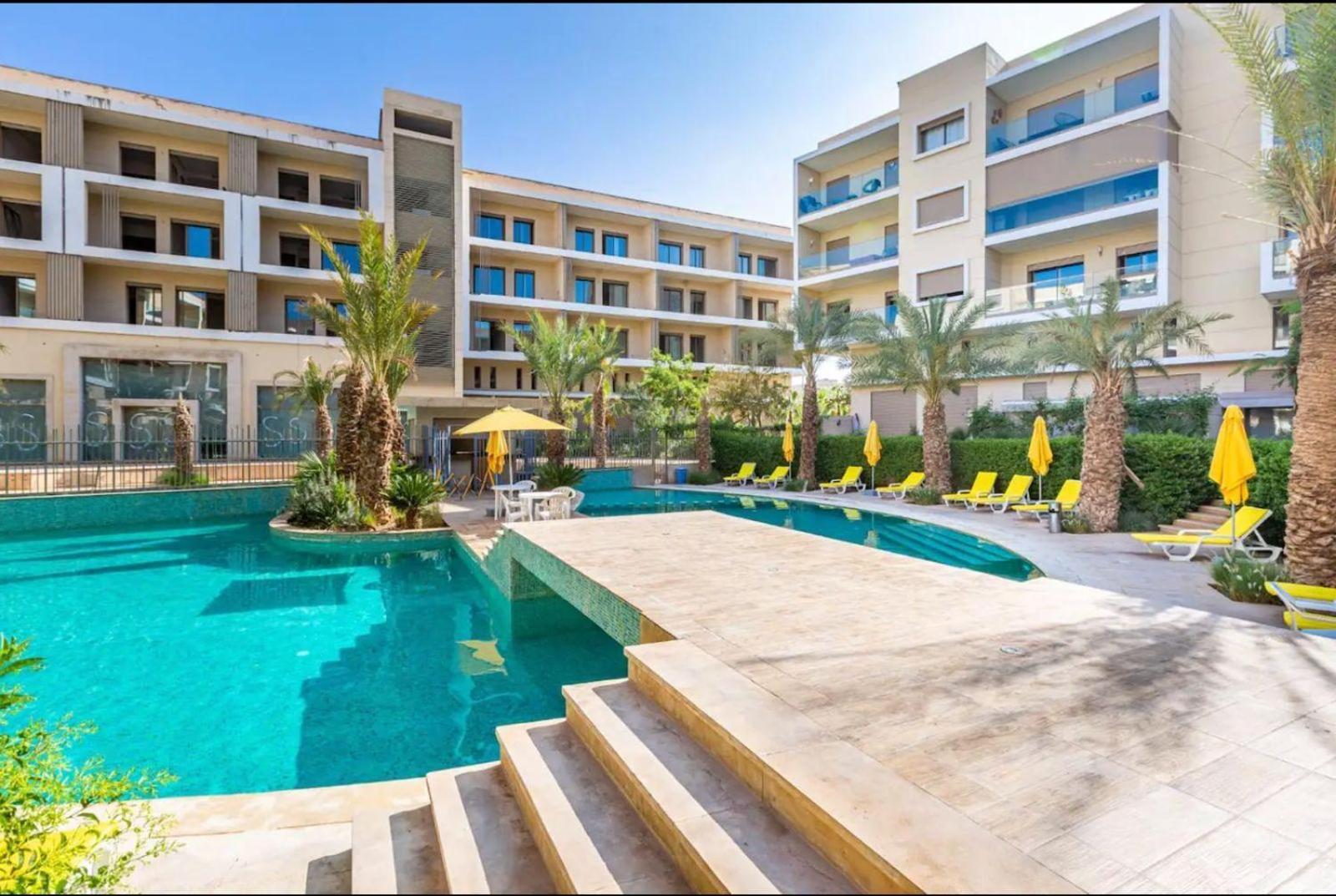 Appartement Luxueux Avec Piscine 10 Minutes Du Centre Ville Marrakesh Esterno foto