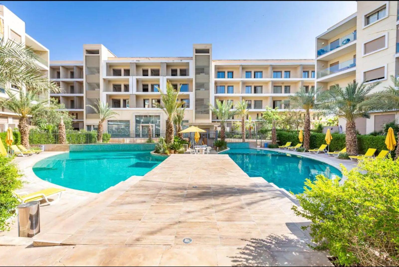 Appartement Luxueux Avec Piscine 10 Minutes Du Centre Ville Marrakesh Esterno foto